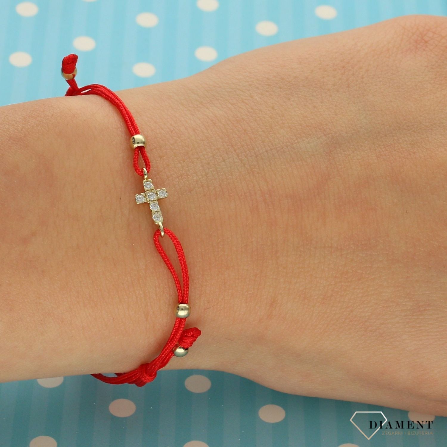 Złota bransoletka na sznurku 333 'krzyż z cyrkonią' BR 4519.  (2).jpg